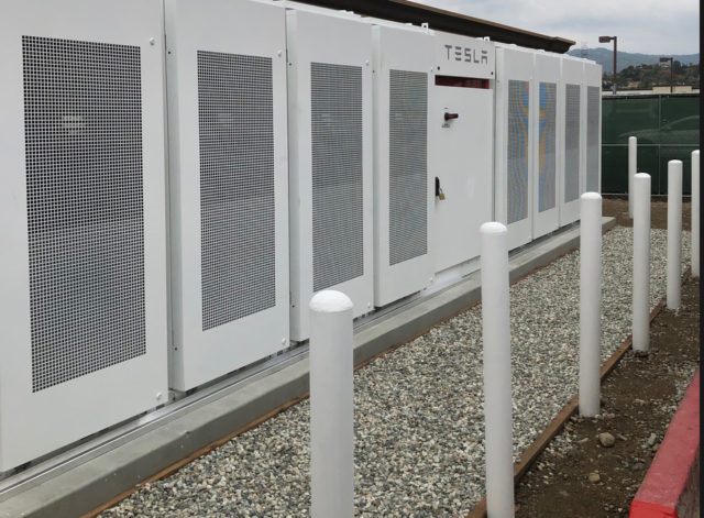 https://shaffercon.com/wp-content/uploads/2019/11/tesla-renewable-energy-640x471.jpg